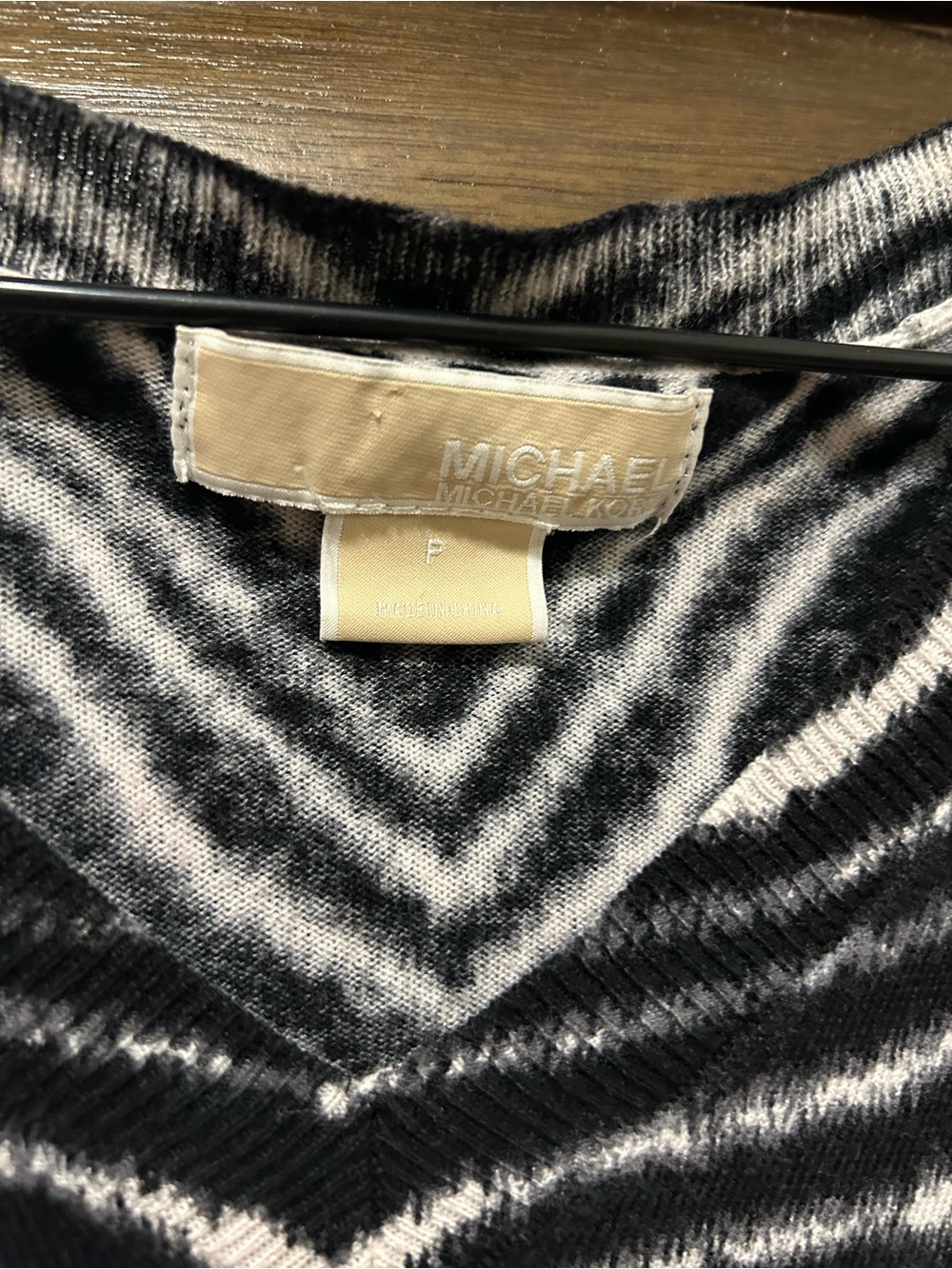 Michael Kors women’s Black & White V-Neck Sweater.